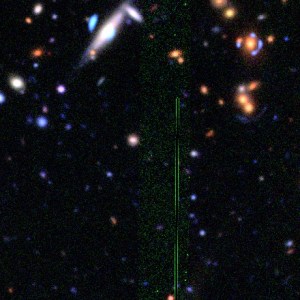 Sims are made using real massive galaxies - which are clustered! Here the sim-making robot has placed two simulated lensed arc systems in the same field as a real gravitational lens...